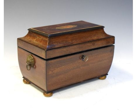 19th Century mahogany sarcophagus shaped two division tea caddy having shell inlaid hinged top on four ball feet, 27cm wide  
