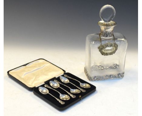 White metal mounted decanter of rectangular form with etched decoration to the glass of a running stag, base marked 800, toge