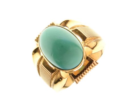 Gold coloured metal turquoise set dress ring with two indistinct stamps inside the shank, 14.8g gross approx, size S  