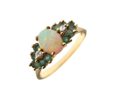 Opal, diamond and emerald set dress ring, the shank stamped 14k, size M, 3.1g gross approx  