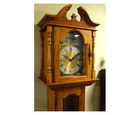 Reproduction oak longcase clock, the arch shaped dial inscribed Emperor Clock Company Ltd, having striking and chiming moveme