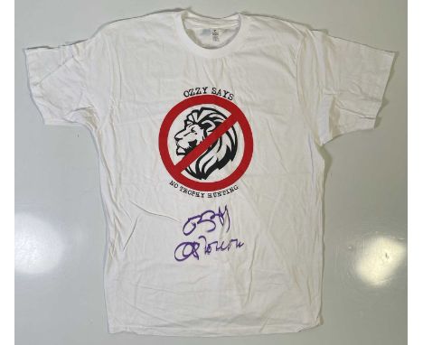 An original t-shirt (L) designed by Ozzy Osbourne, signed in black marker pen by Ozzy Osbourne. Provenance: donated by Ozzy a