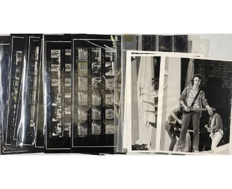 Eight contact sheets (each approx 12 x 9.5") with corresponding negatives stapled to each sheet, approx 70 additional colour 