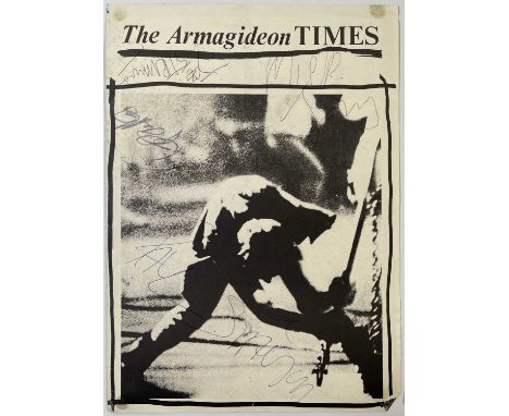 A cover from an Armagideon Times magazine (21x29.5cm) signed in various inks by Joe Strummer, Mick Jones, Paul Simonon, Toppe