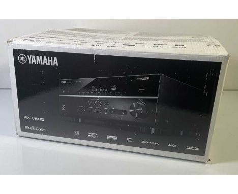 A Yamaha RX V685 AV receiver in original box. With remote.