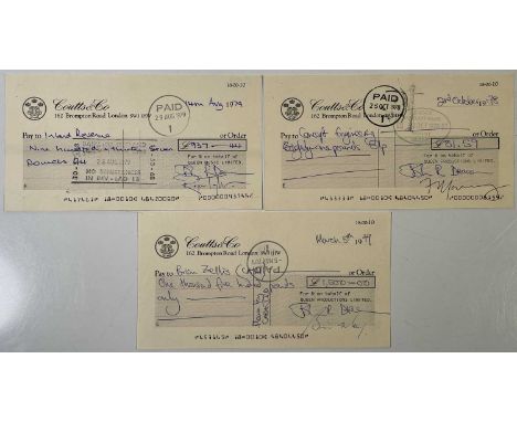 Three "Queen Music" and 'Queen Productions' bank cheques, all dated by hand c 1978/79. One cheque has been signed by John Dea