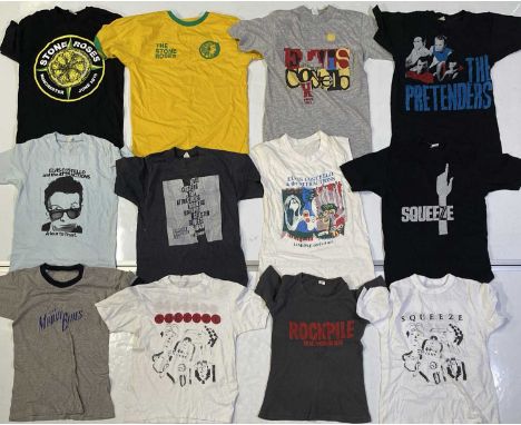 12 mostly c 1980s t-shirts to include: Elvis Costello concert/tour t-shirts (x4), The Pretenders, Squeeze (x3), Rockpile, The