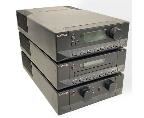 A Cyrus FM7 tuner, a Cyrus Straight Line amplifier and a dAD1 CD player. All power on. Cd remote handset and manuals included