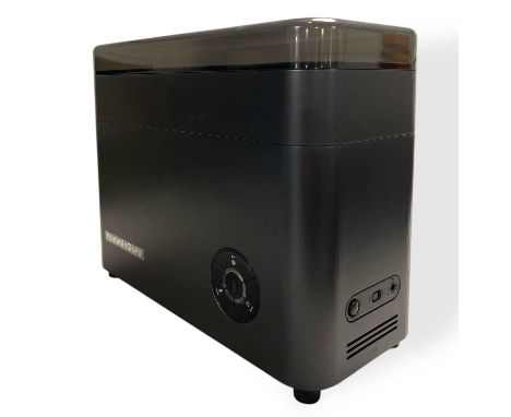 A HumminGuru ultrasonic vinyl record cleaner in orginal box, missing water tank . Also included is a Numark TT usb turntable 