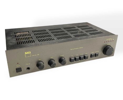 A NAD 3020A stereo amplifier series 20. Powers on and manual included .