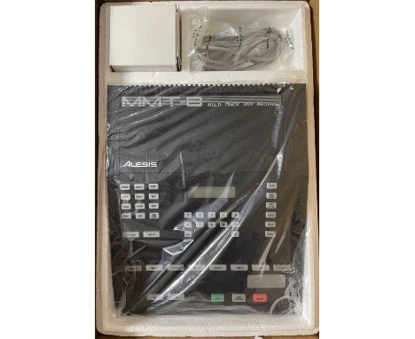 An Alesis MMT-8 multi track MIDI recorder.
