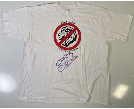 An original t-shirt (XXL) designed by Ozzy Osbourne, signed in black marker pen by Ozzy Osbourne. Provenance: donated by Ozzy