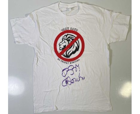 An original t-shirt (L) designed by Ozzy Osbourne, signed in black marker pen by Ozzy Osbourne. Provenance: donated by Ozzy a
