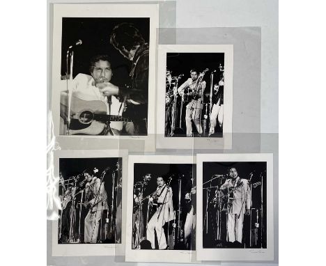 Five high-quality black and white photographic prints with images of Bob Dylan by Terence Spencer. Each signed to border by T