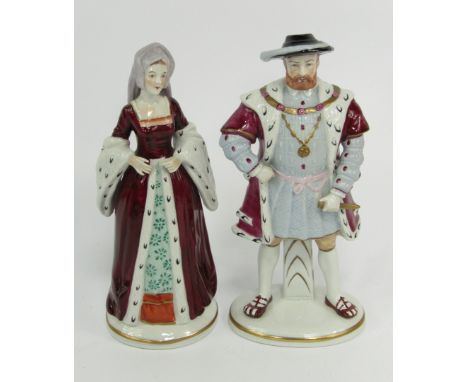 A pair of Sitzendorf porcelain figures, modelled as Henry VIII and Anne Boleyn, 21cm high.