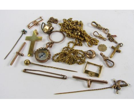 Gold and yellow metal jewellery, including charms, tie pins and scrap, (a quantity).