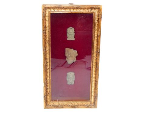Three Mayan sculptures, framed and glazed, 33cm x 15cm.