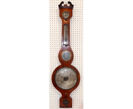 A Victorian rosewood wheel barometer, I T Spriggs, Spalding, silvered dial, thermometer, damp/dry dial, 95cm high.