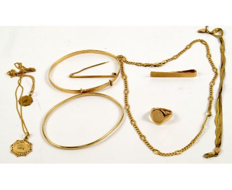 A quantity of 9ct gold jewellery, comprising a lady's signet ring, monogram engraved, size I, two bangles, chain with St Chri