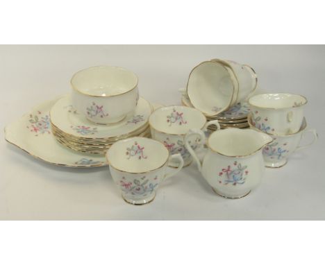 A Royal Albert porcelain part tea service, decorated with ribbons and roses, comprising bread plate, cream jug, sugar bowl, s