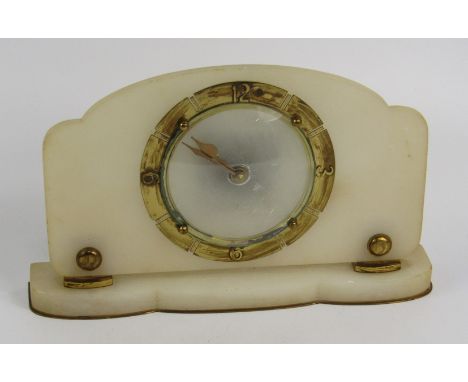 An Art Deco brass and alabaster mantel clock. chapter ring bearing Arabic numerals at quarters, later Quartz movement, 28cm l