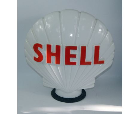 A glass Shell petrol pump globe, 44.5cm high.