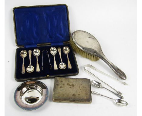 A set of six George V silver tea spoons, and a pair of sugar tongs, Sheffield 1911, cased, George VI cigarette case with engi