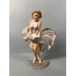 Marilyn Monroe painted cast Iron figure of her wearing the famous white dress approximately 34cm