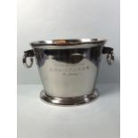 Champagne cooler in polished metal approximately 31 x 25 cm
