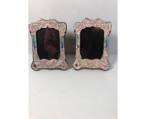 Pair of Silver and Enamel Art Nouveau style photo frames marked Sterling, to take a 10 x 16cm picture 