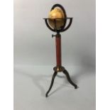 Table top world globe on brass tripod stand approximately 28cm high