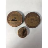 Three different brass cased compasses of nautical interest
