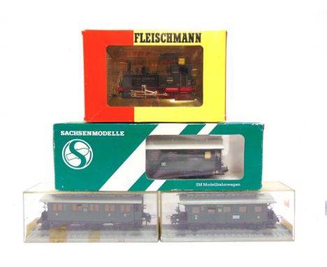 [HO GAUGE]. A GERMAN RAILWAY COLLECTION comprising a Fleischmann No.4010, Deutsche Reichsbahn 0-6-0 tank locomotive, 89 7462,