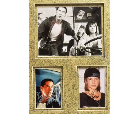 AUTOGRAPHS - 'SPEED', KEANU REEVES &amp; SANDRA BULLOCK A framed montage, comprising two colour photographic portraits signed