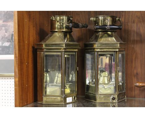 A PAIR OF VINTAGE BRASS CARRIAGE LANTERNS