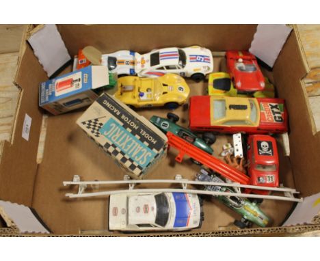 A SELECTION OF VINTAGE SLOT CARS ETC