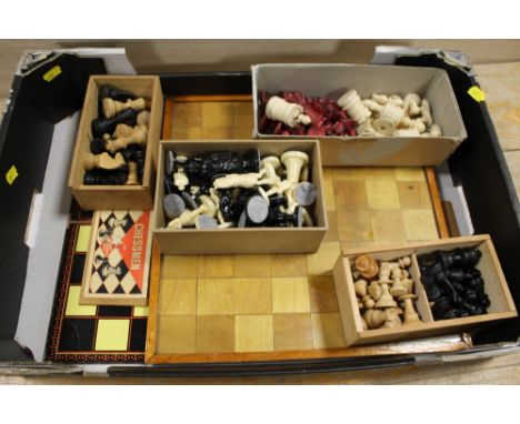 A BOX OF VINTAGE CHESS PIECES, BOARDS ETC