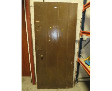 A LARGE VINTAGE WOODEN DOOR APPROX 88 X 197 CM