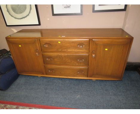 AN ERCOL SIDEBOARD - W 155 CM