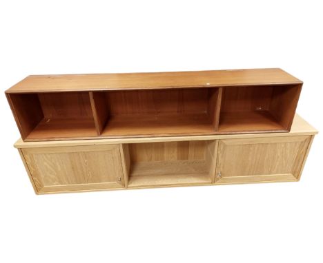 A Scandinavian teak wall shelf (length 169cm), together with a further oak effect wall shelf.