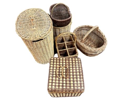 Seven wicker baskets, picnic hamper, wine basket etc 