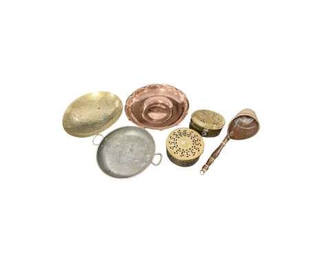 Six brass and copper items including a ladle, trays etc.