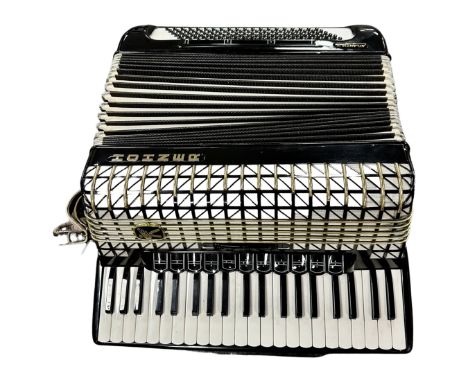 A Hohner Atlantic IV De Luxe piano accordion.