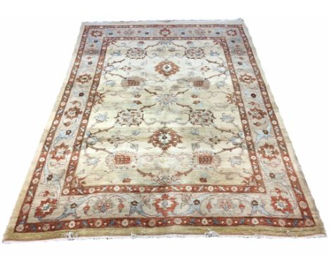 FINE PERSIAN HERIZ CARPET, 268cm x 176cm, palmette and scrolling vine all-over design with sky blue detailing in the field an