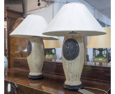 TABLE LAMPS, a pair, of continental Art Nouveau inspiration, mottled finish ceramic, wooden bases and shades, each 65cm H ove