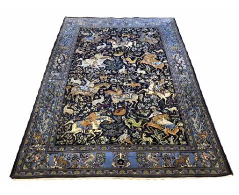 QUM HUNTING DESIGN CARPET, 242cm x 163cm, all-over design within complimentary bands and borders.
