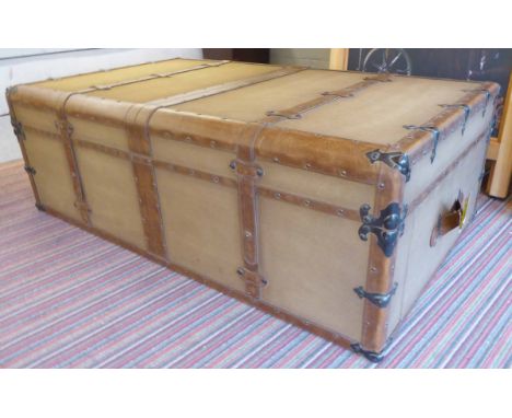 LOW TABLE, campaign style trunk design, canvas, leather and metal bound with a drawer to each end, 41cm H x 121cm  71cm.