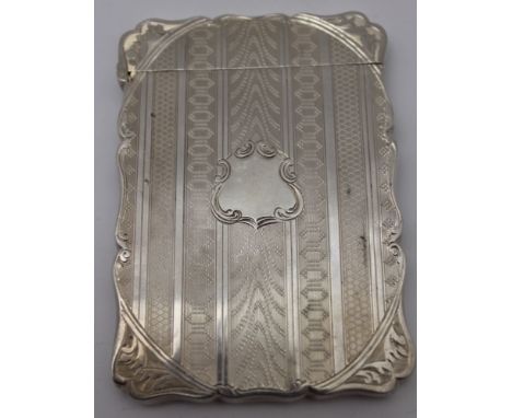 Edward Smith, A mid Victorian silver visiting card case, hinged cover, serpentine sides with engine turned decoration, blind 