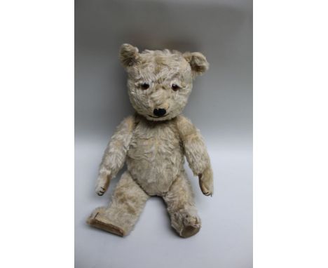 A mid-century plush teddy bear 'sqeezeable' with lullaby chime, 44cm (ear to toe) 