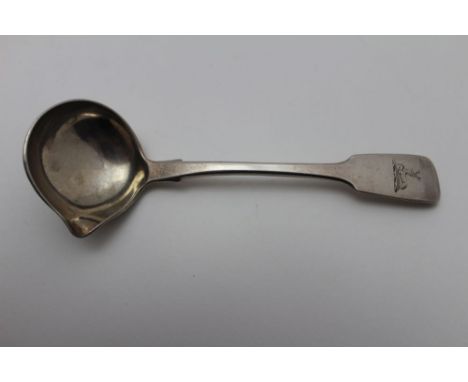 John Smyth, a mid-19th century Irish silver ladle with pouring lip, fiddle pattern handle with stag crest Dublin 1855, 46g 